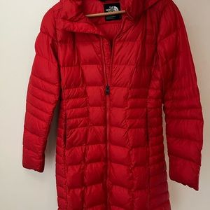 Bright red Northface puffer jacket. Perfect for winter and freezing temps